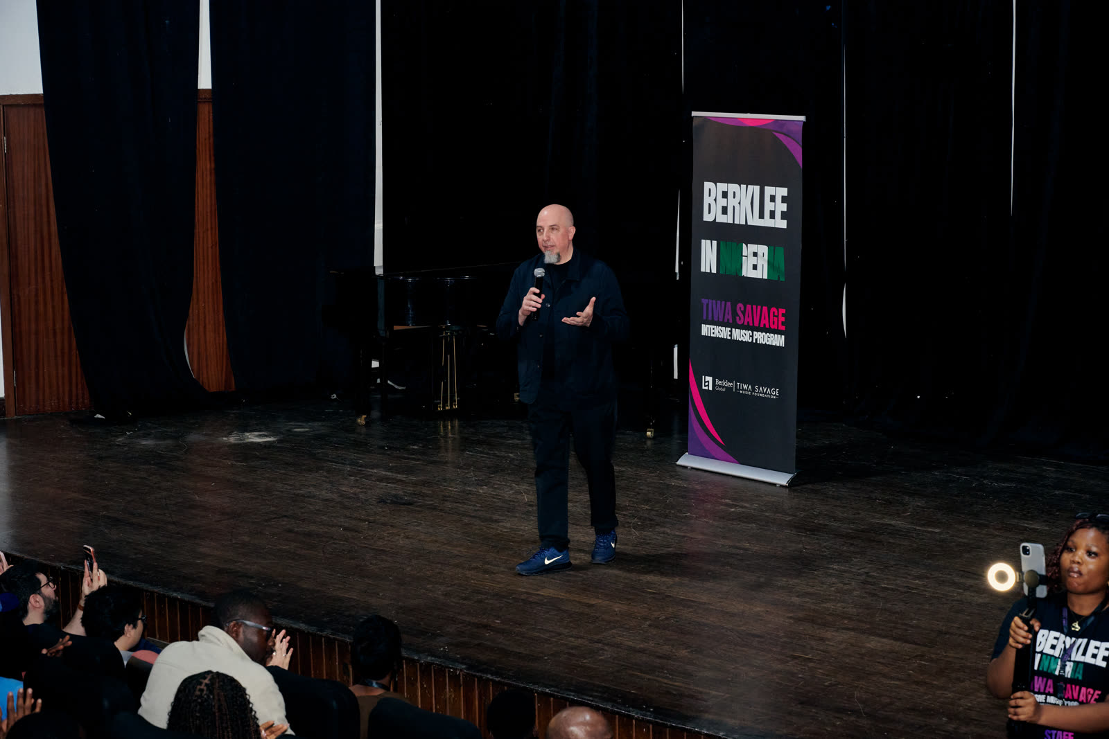 A Berklee faculty member presents on stage during the intensive
