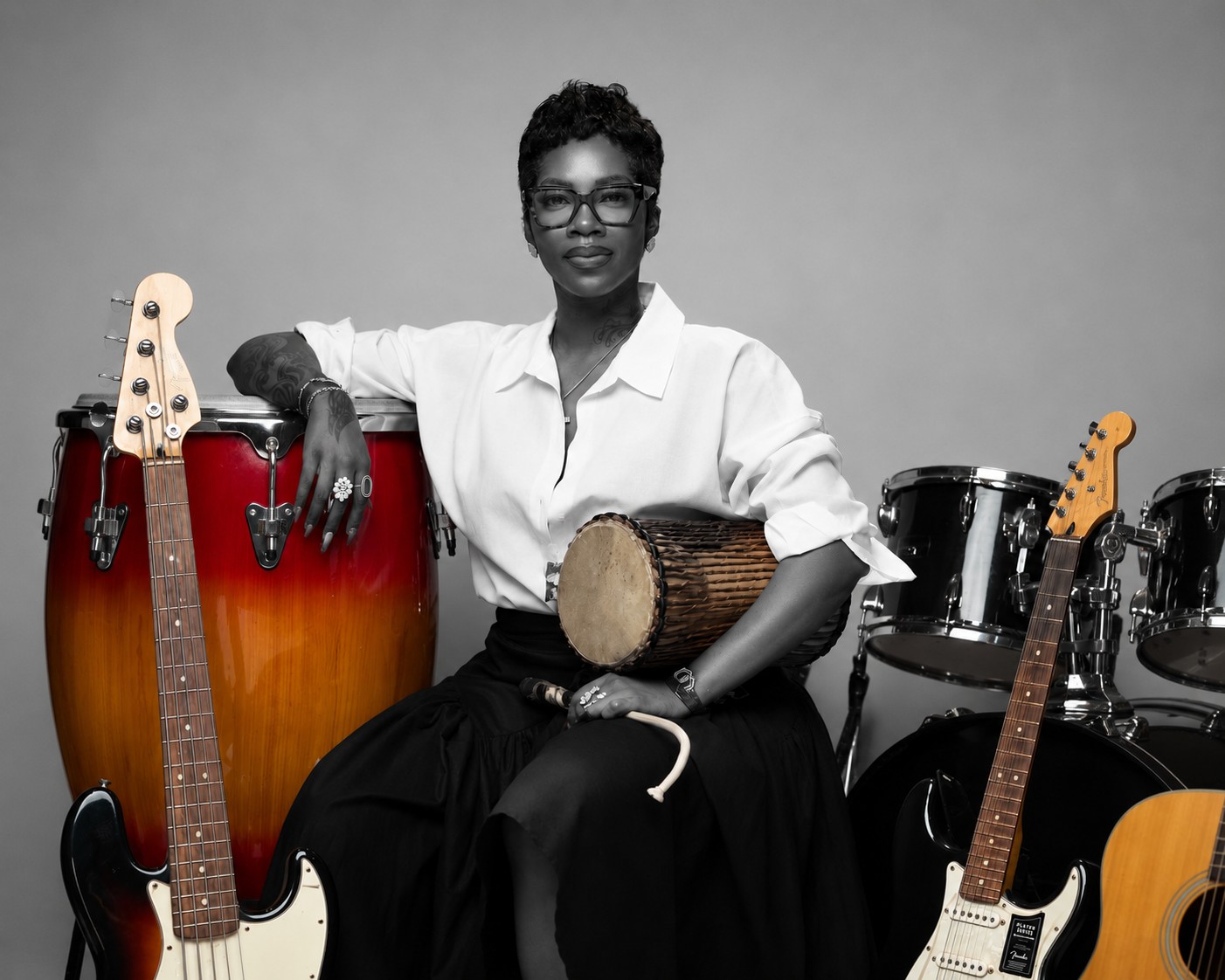 Tiwa Savage, founder of the Tiwa Savage Music Foundation, seated among the instruments